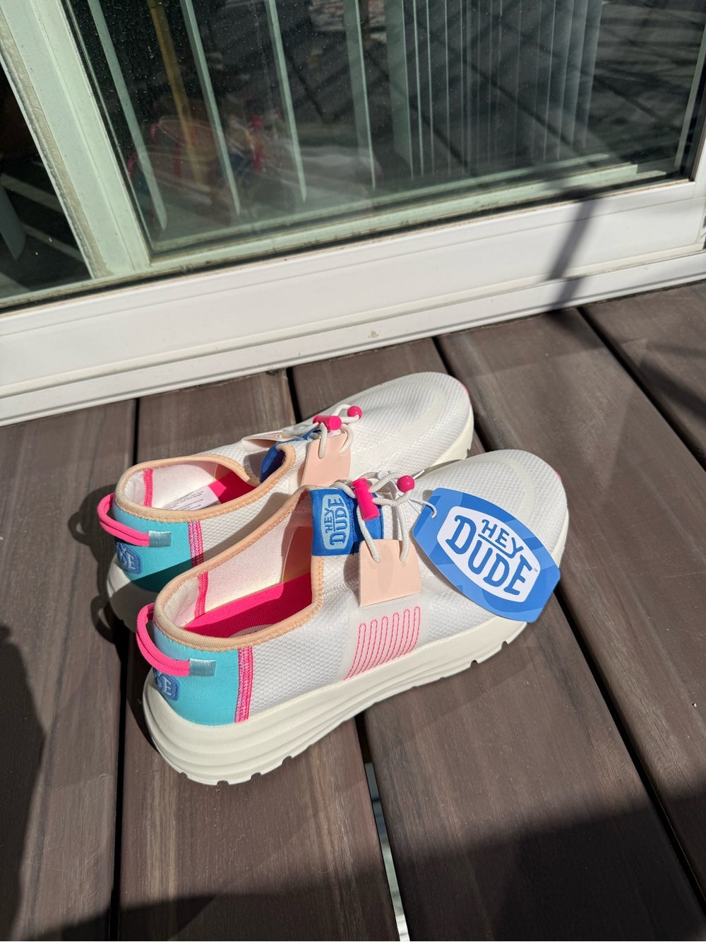 Hey Dude Women’s Lightweight Slip-On Sneakers in White with Pink & Aqua